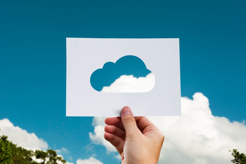 Cloud shape stencil with sky in background